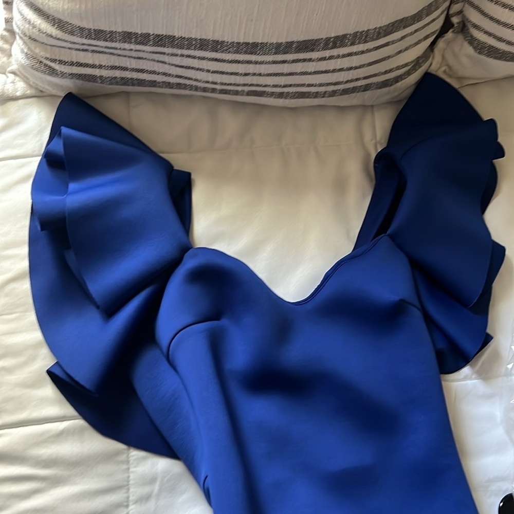 Ruffle shoulder blue gown